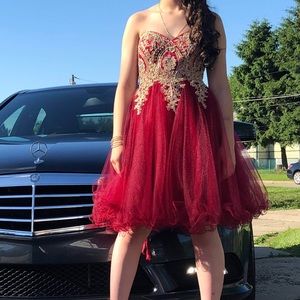 dress. Size 4. Burgundy w/gold appliqués.